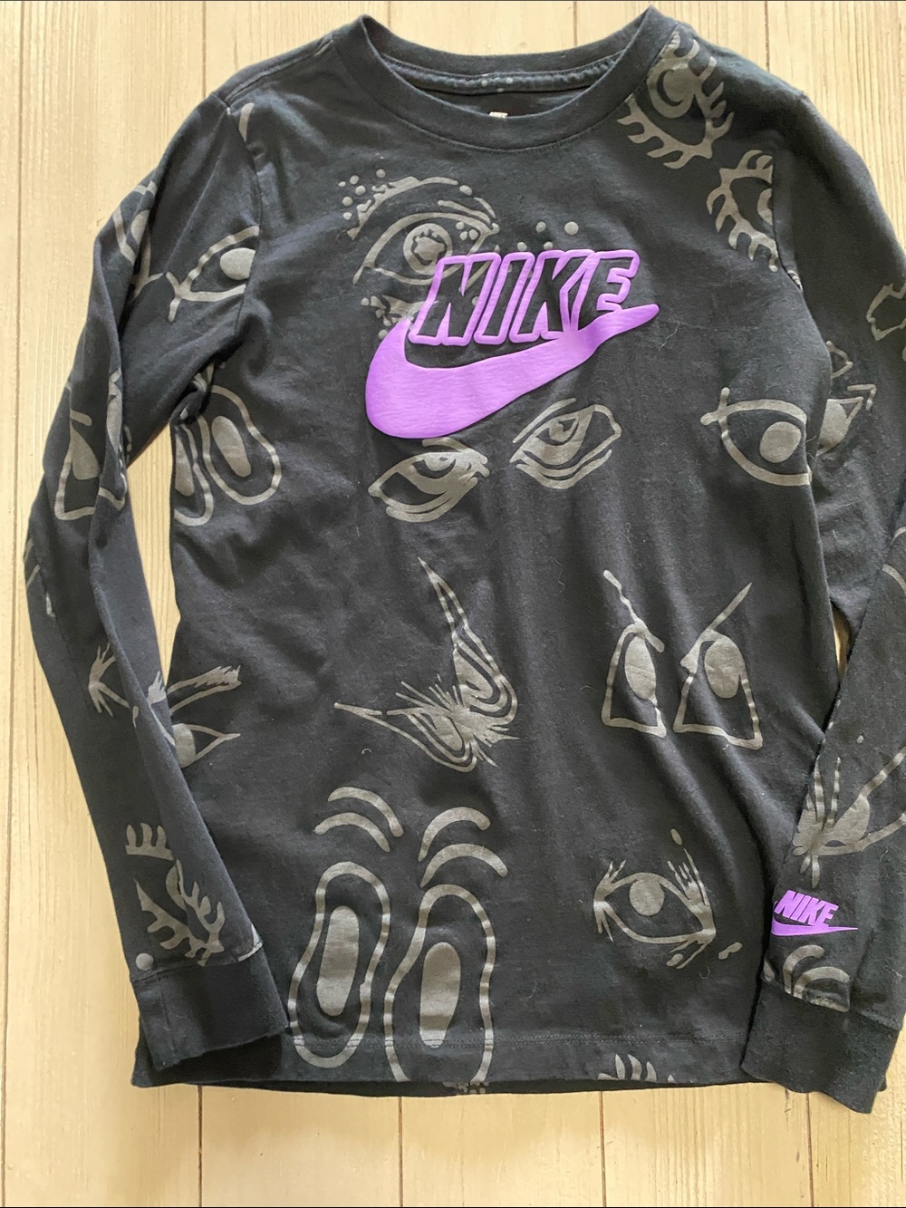 Nike Black Long-Sleeve Tee with Purple Swoosh and Gray Eye Graphics- Halloween